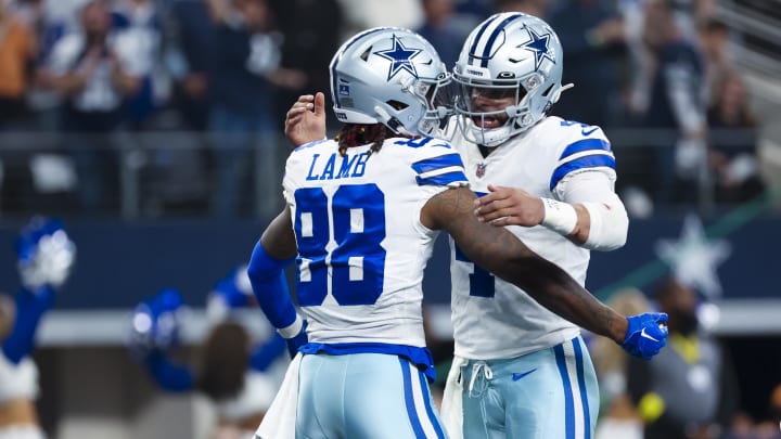 Dec 24, 2022; Arlington, Texas, USA; Dallas Cowboys wide receiver CeeDee Lamb (88) celebrates with Dallas Cowboys quarterback Dak Prescott (4) after scoring a touchdown  during the first half against the Philadelphia Eagles at AT&T Stadium. Mandatory Credit: Kevin Jairaj-USA TODAY Sports