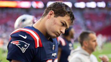 Dec 15, 2024; Glendale, Arizona, USA; New England Patriots quarterback Drake Maye (10) reacts against the Arizona Cardinals at State Farm Stadium. Mandatory Credit: Mark J. Rebilas-Imagn Images
