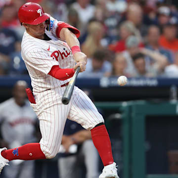 Aug 27, 2024; Philadelphia, Pennsylvania, USA; Philadelphia Phillies outfielder Austin Hays (9) hits a double against the Houston Astros during the third inning at Citizens Bank Park. 