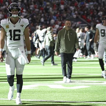 Nov 9, 2025; Houston, Texas, USA; Jacksonville Jaguars quarterback Trevor Lawrence (16) walks off the field after the game against the Houston Texans at NRG Stadium. Mandatory Credit: Troy Taormina-Imagn Images