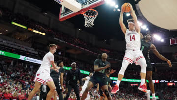 Dec 22, 2023; Madison, Wisconsin, USA; Wisconsin Badgers forward Carter Gilmore (14) rebounds the ball.