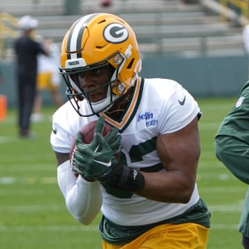 Green Bay Packers running back MarShawn Lloyd (32) goes through drills during minicamp. He is on course to play in Week 1.