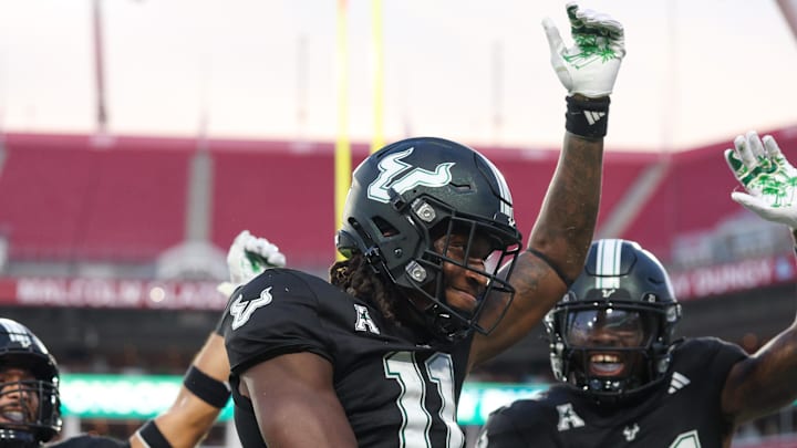 Aug 28, 2025; Tampa, Florida, USA; South Florida Bulls wide receiver Keshaun Singleton (11) reacts after scoring a touchdown against the Boise State Broncos in the third quarter at Raymond James Stadium. Mandatory Credit: Nathan Ray Seebeck-Imagn Images 