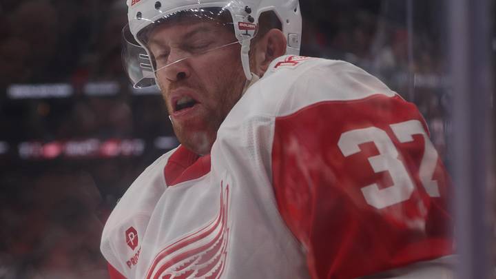 Mar 8, 2026; Newark, New Jersey, USA;  Detroit Red Wings left wing J.T. Compher (37) reacts to the puck against the New Jersey Devils during the first period at Prudential Center. Mandatory Credit: Thomas Salus-Imagn Images