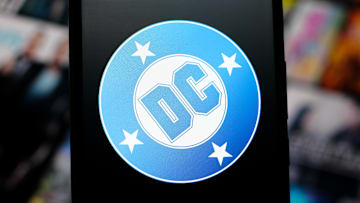 In this photo illustration, the DC Comics logo is seen.