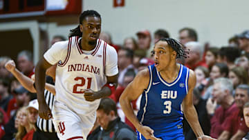 Eastern Illinois guard Nakyel Shelton (3) celebrates in front of Indiana forward Mackenzie Mgbako (21) after a made shot.  