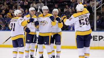Nov 10, 2025; New York, New York, USA; Nashville Predators right wing Matthew Wood (71) celebrates his goal against the New York Rangers with teammates during the first period at Madison Square Garden. Mandatory Credit: Brad Penner-Imagn Images