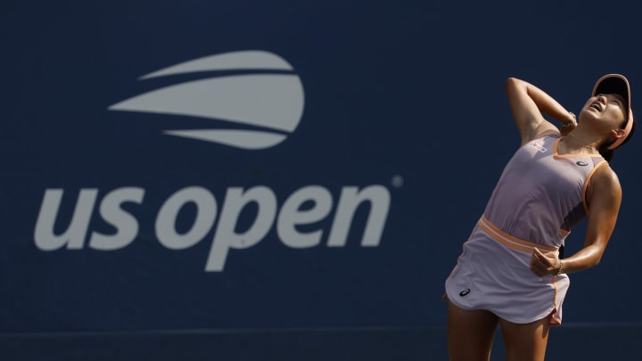 Aug 26, 2024; Flushing, NY, USA; Moyuka Uchijima (JPN) serves against Tamara Korpatsch (GER)(not pictured) in a women's singles match on day one of the 2024 U.S. Open tennis tournament at USTA Billie Jean King National Tennis Center. Mandatory Credit: Geoff Burke-USA TODAY Sports