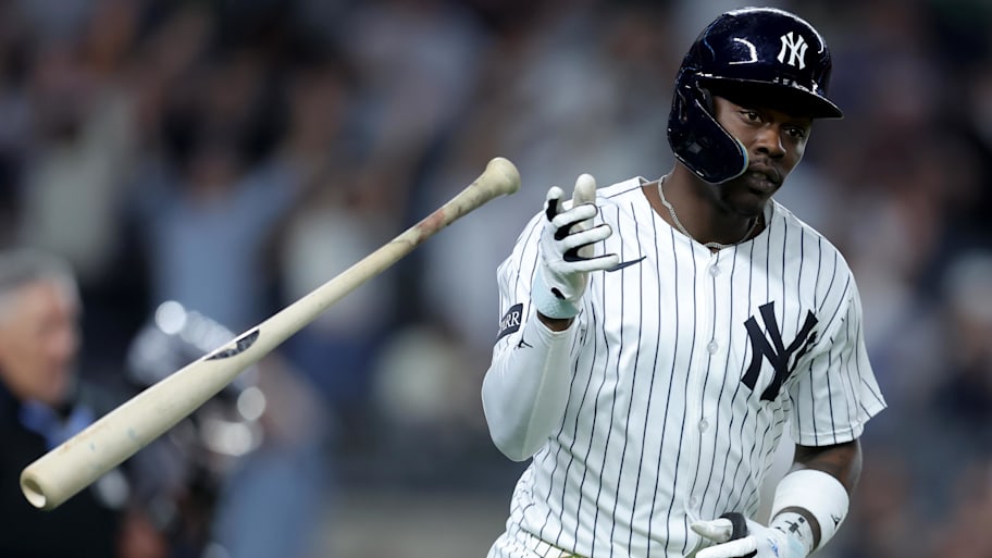 Yankees third baseman Chisholm Jr. flips his bat after hitting a solo home run against the Cleveland Guardians during the seventh inning at Yankee Stadium. | Brad Penner-Imagn Images
