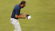 Scottie Scheffler celebrates after winning the 153rd Open Championship.