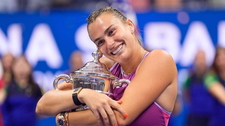 Sept 7, 2024; Flushing, NY, USA Aryna Sabalenka with the US Open Trophy after beating Jessica Pegula (USA) in the women's singles final on day thirteen of the 2024 U.S. Open tennis tournament at USTA Billie Jean King National Tennis Center. Mandatory Credit: Robert Deutsch-Imagn Images