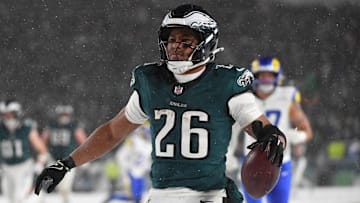 Jan 19, 2025; Philadelphia, Pennsylvania, USA; Philadelphia Eagles running back Saquon Barkley (26) celebrates after scoring a touchdown against the Los Angeles Rams in the second half in a 2025 NFC divisional round game at Lincoln Financial Field.