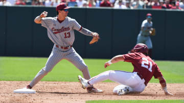 Mar 30, 2024; Tuscaloosa, Alabama, USA; South Carolina infielder Will Tippett forces Alabama base runner Ian Petrutz (21) at second and throws to first to complete a double play at Sewell-Thomas Stadium in the final game of the weekend series. South Carolina held on for a 9-8 victory.