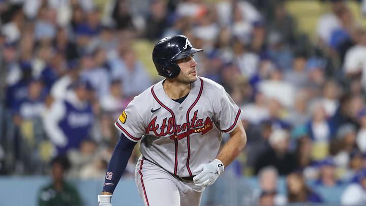 May 9, 2026; Los Angeles, California, USA;  Atlanta Braves first baseman Matt Olson (28) hits a single during the seventh inning against the Los Angeles Dodgers at Dodger Stadium. Mandatory Credit: Kiyoshi Mio-Imagn Images