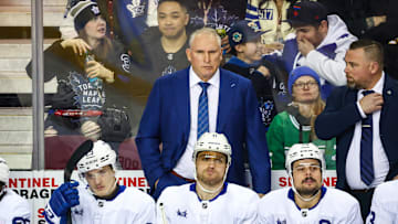 Feb 4, 2025; Calgary, Alberta, CAN; Toronto Maple Leafs head coach Craig Berube on his bench against the Calgary Flames during the first period at Scotiabank Saddledome. Mandatory Credit: Sergei Belski-Imagn Images