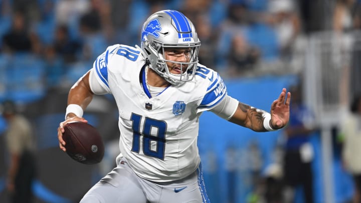 Aug 25, 2023; Charlotte, NC;  Detroit Lions quarterback Adrian Martinez (18) with the ball in the fourth quarter at Bank of America Stadium. Mandatory Credit: Bob Donnan-USA TODAY Sports