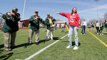Randi Martin, mother of Kansas City Chiefs quarterback Patrick Mahomes, interacts with the Green Bay Packers Tailgaters Band during Field Fest on April 23, 2025, at City Stadium in Green Bay, Wis. The event was organized by the city of Green Bay and Greater Green Bay YMCA to celebrate NFL draft week.