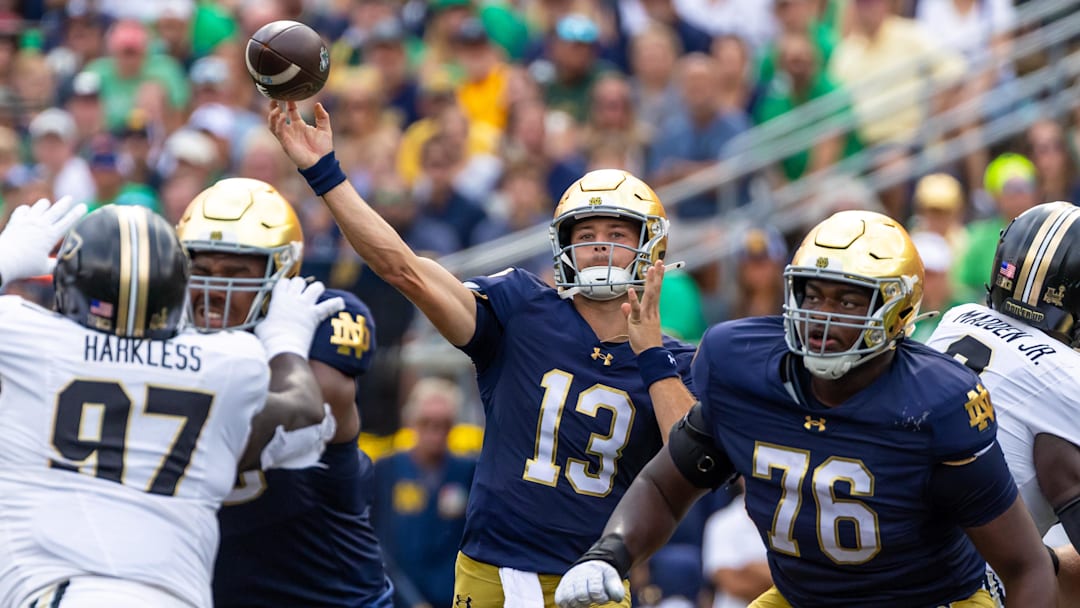 Sep 20, 2025; South Bend, Indiana, USA; Notre Dame Fighting Irish quarterback CJ Carr (13) throws a pass against the Purdue Boilermakers during the first half at Notre Dame Stadium. Mandatory Credit: Michael Caterina-Imagn Images