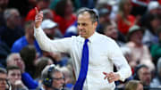 Mar 22, 2025; Wichita, KS, USA; Drake Bulldogs head coach Ben McCollum reacts after a play against the Texas Tech Red Raiders during the first half at Intrust Bank Arena. Mandatory Credit: Nick Tre. Smith-Imagn Images