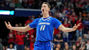 Mar 20, 2025; Lexington, KY, USA; Creighton Bluejays center Ryan Kalkbrenner (11) celebrate after making a three pointer during the second half against the Louisville Cardinals in the first round of the NCAA Tournament at Rupp Arena. Mandatory Credit: Aaron Doster-Imagn Images