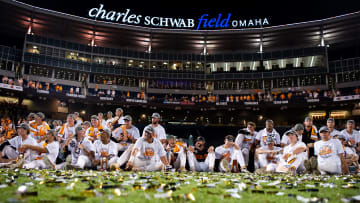 The Tennessee baseball team watches highlights of their College World Series games on the scoreboard after game three of the NCAA College World Series finals between Tennessee and Texas A&M at Charles Schwab Field in Omaha, Neb., on Monday, June 24, 2024.
