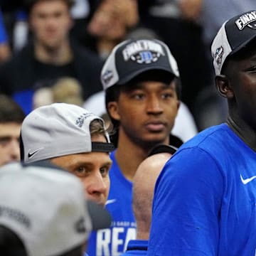 Mar 29, 2025; Newark, NJ, USA; Duke Blue Devils center Khaman Maluach (9) cheers as the Duke Blue Devils cut down the nets after beating the Alabama Crimson Tide in the East Regional final of the 2025 NCAA tournament at Prudential Center. Mandatory Credit: Robert Deutsch-Imagn Images