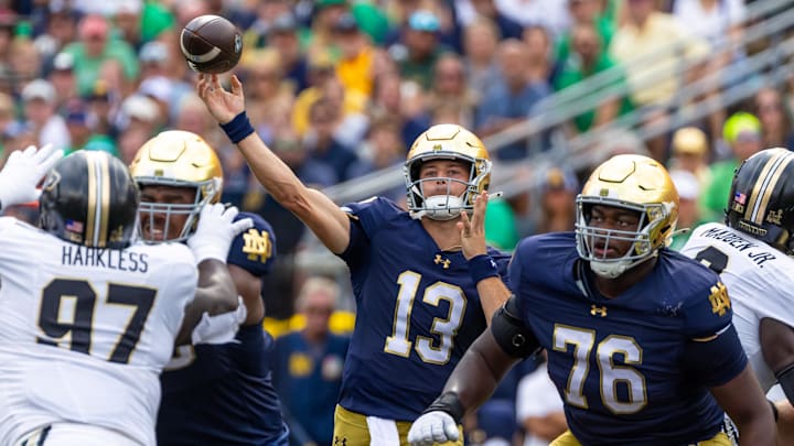 Sep 20, 2025; South Bend, Indiana, USA; Notre Dame Fighting Irish quarterback CJ Carr (13) throws a pass against the Purdue Boilermakers during the first half at Notre Dame Stadium. Mandatory Credit: Michael Caterina-Imagn Images