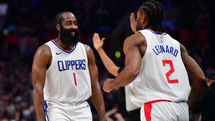 Los Angeles Clippers guard James Harden (1) reacts after forward Kawhi Leonard (2) scores three point basket against the Brooklyn Nets during the second half at Crypto.com Arena. Mandatory Credit: