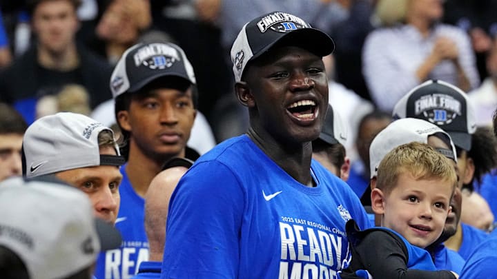 Mar 29, 2025; Newark, NJ, USA; Duke Blue Devils center Khaman Maluach (9) cheers as the Duke Blue Devils cut down the nets after beating the Alabama Crimson Tide in the East Regional final of the 2025 NCAA tournament at Prudential Center. Mandatory Credit: Robert Deutsch-Imagn Images Mar 29, 2025; Newark, NJ, USA; Duke Blue Devils center Khaman Maluach (9) cheers as the Duke Blue Devils cut down the nets after beating the Alabama Crimson Tide in the East Regional final of the 2025 NCAA tournament at Prudential Center. Mandatory Credit: Robert Deutsch-Imagn Images