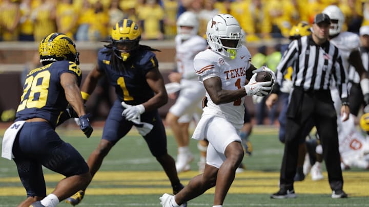 Sep 7, 2024; Ann Arbor, Michigan, USA; Texas Longhorns running back Quintrevion Wisner (26) rushes in the second half against the Michigan Wolverines at Michigan Stadium. Mandatory Credit: Rick Osentoski-Imagn Images