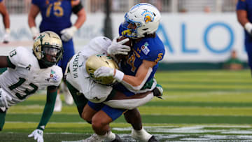 Bernard Gooden makes a tackle on San Jose State's Matthew Coleman in USF's Hawai`i Bowl win