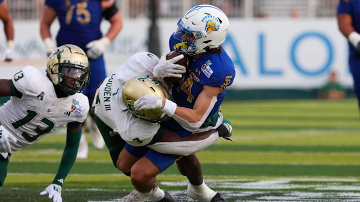 Bernard Gooden makes a tackle on San Jose State's Matthew Coleman in USF's Hawai`i Bowl win
