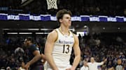 Dec 21, 2024; Evanston, Illinois, USA; Northwestern Wildcats guard Brooks Barnhizer (13) gestures after dunking the ball against the DePaul Blue Demons during the second half at Welsh-Ryan Arena. Mandatory Credit: David Banks-Imagn Images