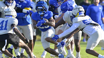Jul 29, 2024; Los Angeles, CA, USA; Los Los Angeles Rams running back Blake Corum (22) carries the ball during training camp at Loyola Marymount University. Mandatory Credit: Jayne Kamin-Oncea-USA TODAY Sports