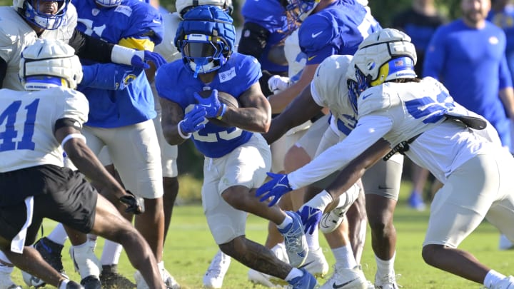 Jul 29, 2024; Los Angeles, CA, USA; Los Los Angeles Rams running back Blake Corum (22) carries the ball during training camp at Loyola Marymount University. Mandatory Credit: Jayne Kamin-Oncea-USA TODAY Sports