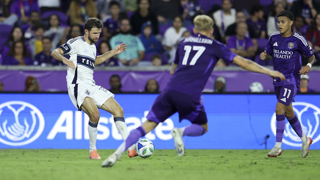 Oct 11, 2025; Orlando, Florida, USA; Vancouver Whitecaps forward Thomas Muller (13) passes the ball against Orlando City in the second half at Inter&Co Stadium. Mandatory Credit: Nathan Ray Seebeck-Imagn Images