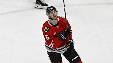 Mar 30, 2025; Chicago, Illinois, USA;  Chicago Blackhawks defenseman Sam Rinzel (6) reacts after missing a shot on goal against the Utah Hockey Club during the second period at United Center. Mandatory Credit: Matt Marton-Imagn Images