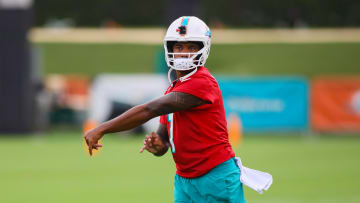 Jul 24, 2024; Miami Gardens, FL, USA; Miami Dolphins quarterback Tua Tagovailoa (1) throws the football during training camp at Baptist Health Training Complex. Mandatory Credit: Sam Navarro-USA TODAY Sports