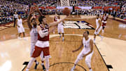 Apr 4, 2015; Indianapolis, IN, USA; Wisconsin Badgers forward Frank Kaminsky (44) shoots the ball against Kentucky Wildcats forward Willie Cauley-Stein (15) during the second half of the 2015 NCAA Men's Division I Championship semi-final game at Lucas Oil Stadium. Mandatory Credit: Chris Steppig/NCAA Photos-Pool Photo via Imagn Images