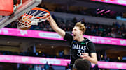 Dec 6, 2025; Dallas, Texas, USA; Dallas Mavericks forward Cooper Flagg (32) dunks 