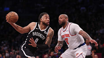 Brooklyn Nets forward Trendon Watford goes to the basket after the game New York Knicks forward P.J. Tucker. Mandatory Credit: Vincent Carchietta-Imagn Images