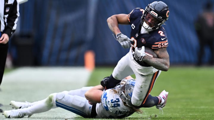 DJ Moore tries to escape the grasp of Detroit Lions linebacker Alex Anzalone in a 28-13 Bears victory.