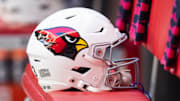 Dec 15, 2024; Glendale, Arizona, USA; Detailed view of an Arizona Cardinals helmet at State Farm Stadium. Mandatory Credit: Mark J. Rebilas-Imagn Images