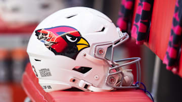Dec 15, 2024; Glendale, Arizona, USA; Detailed view of an Arizona Cardinals helmet at State Farm Stadium. Mandatory Credit: Mark J. Rebilas-Imagn Images