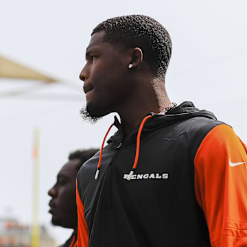 Sep 8, 2024; Cincinnati, Ohio, USA; Cincinnati Bengals wide receiver Tee Higgins (5) walks onto the field before the game against the New England Patriots at Paycor Stadium. Mandatory Credit: Katie Stratman-Imagn Images