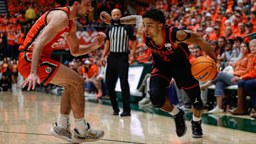 Feb 8, 2025; Fort Collins, Colorado, USA; San Diego State Aztecs guard Nick Boyd (2) controls the ball as Colorado State Rams guard Ethan Morton (25) guards in the first half at Moby Arena. Mandatory Credit: Isaiah J. Downing-Imagn Images