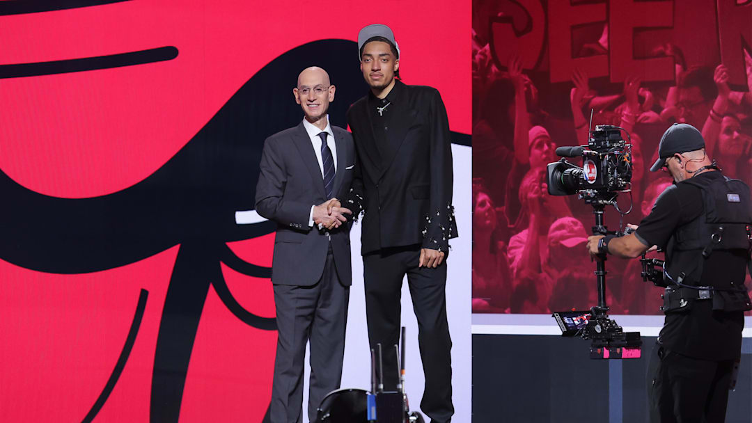 Jun 25, 2025; Brooklyn, NY, USA;  Noa Essengue stands with NBA commissioner Adam Silver after being selected as the 12th pick by the Chicago Bulls in the first round of the 2025 NBA Draft at Barclays Center. Mandatory Credit: Brad Penner-Imagn Images