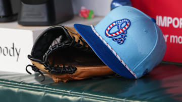 Jul 4, 2025; Atlanta, Georgia, USA; A detailed view of the Baltimore Orioles 4th of July hat in the dugout against the Atlanta Braves in the third inning at Truist Park.