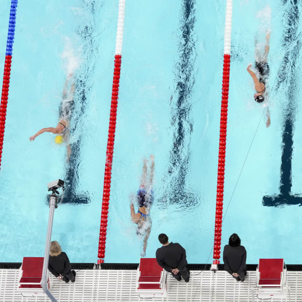 Titmus (left) and Madden (right) kept in close range to gold medalist Ledecky (center) during the race.