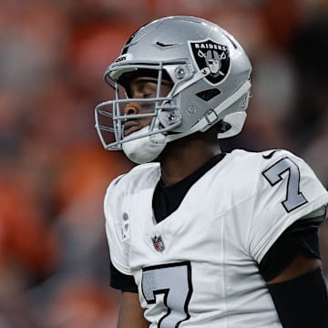 Nov 6, 2025; Denver, Colorado, USA; Las Vegas Raiders quarterback Geno Smith (7) reacts during the first half at Empower Field at Mile High. Mandatory Credit: Isaiah J. Downing-Imagn Images